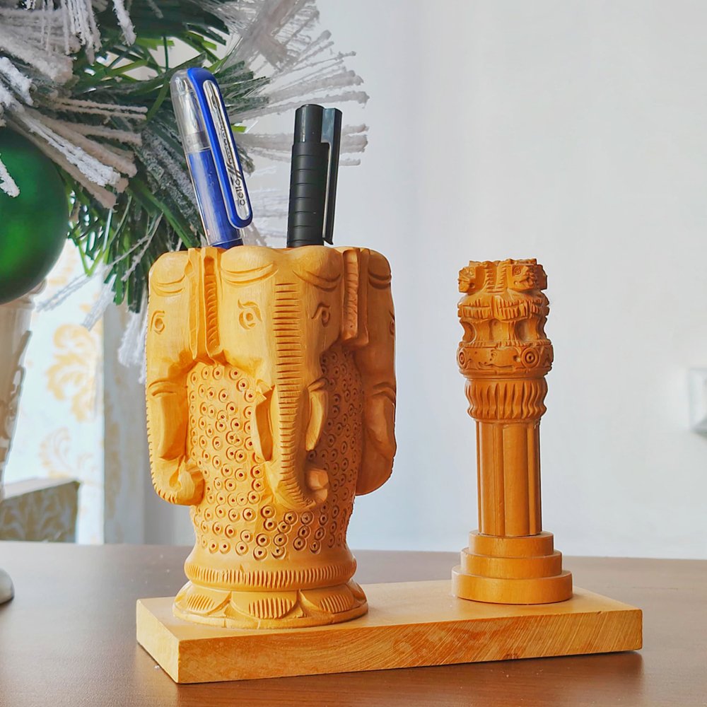 Ashoka Pillar Tabletop Pen Holder crafted in white wood with 4 elephant head carving